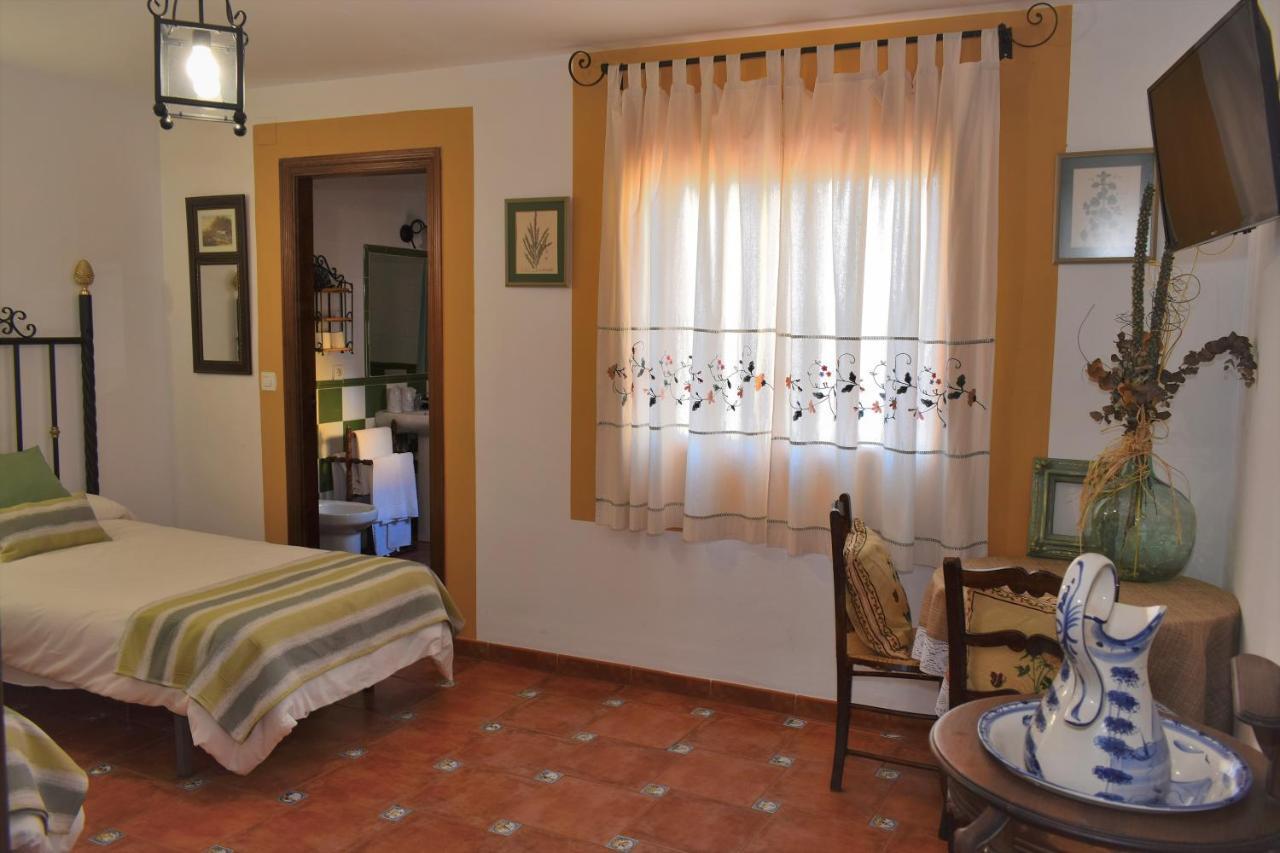 Posada El Arriero Torrejon el Rubio Bagian luar foto